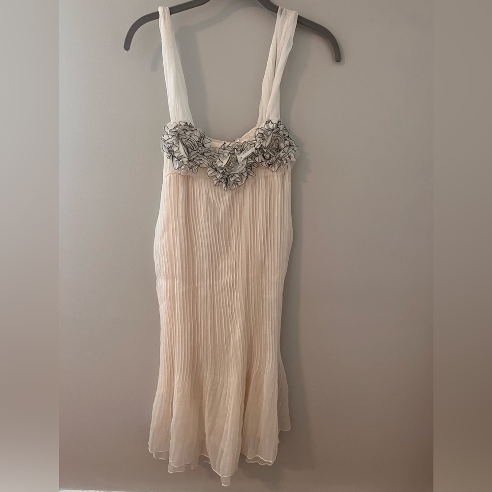 Beautiful ruffle with floral detail cream dress